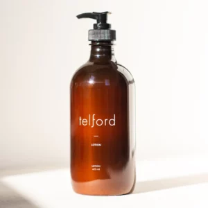 product photograph of Telford lotion. It comes in a brown/ale coloured bottle with a pump dispenser.